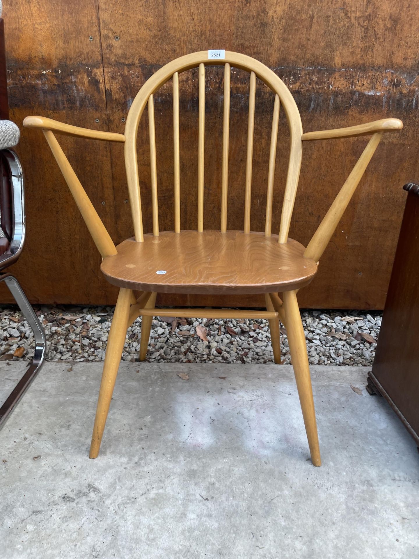 AN ERCOL BLONDE CARVER CHAIR - Image 2 of 3