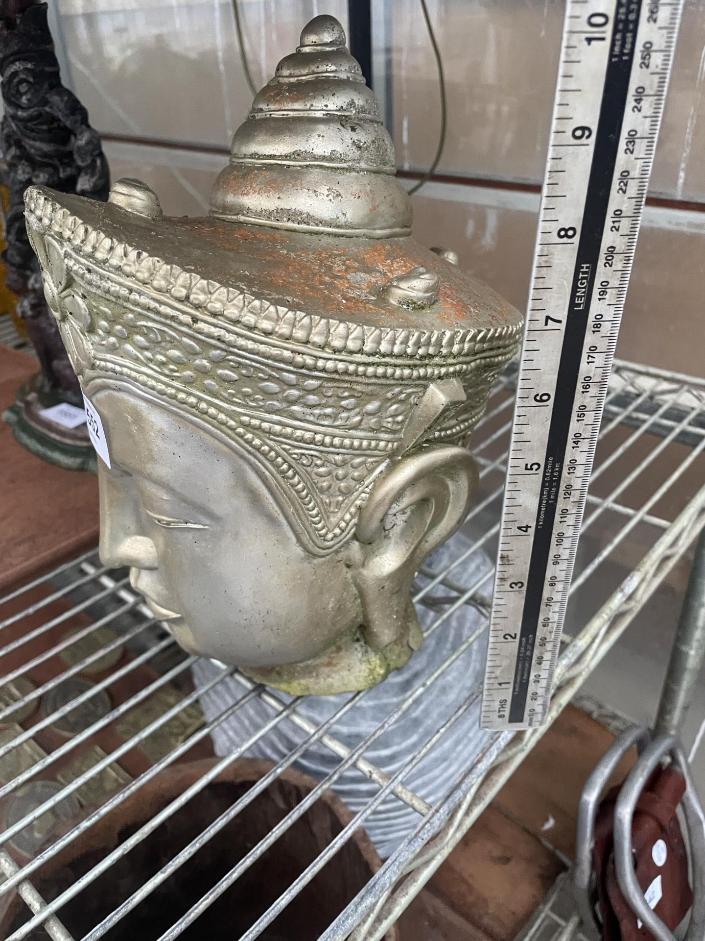A DECORATIVE PAINTED RECONSTITUTED STONE BUDDAH HEAD - Image 2 of 2