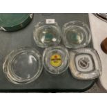 FIVE GLASS ASHTRAYS TO INCLUDE HOLSTEN, PILSNER AND WARSTEINER