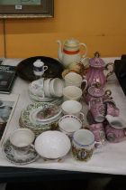 A LARGE QUANTITY OF TEAWARE TO INCLUDE A PINK JAPANESE COFFEE SET, COFFEE POT, CREAM JUG, SUGAR