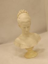 A BUST OF A LADY ON A MARBLE PLINTH, HEIGHT 33CM