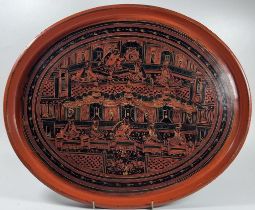 A VINTAGE CHINESE RED LACQUERED DRINKS TRAY WITH TEMPLE SCENE DESIGN, LENGTH 39CM