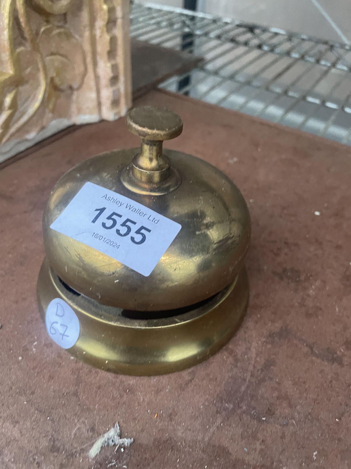 A SMALL VINTAGE BRASS RECEPTION BELL