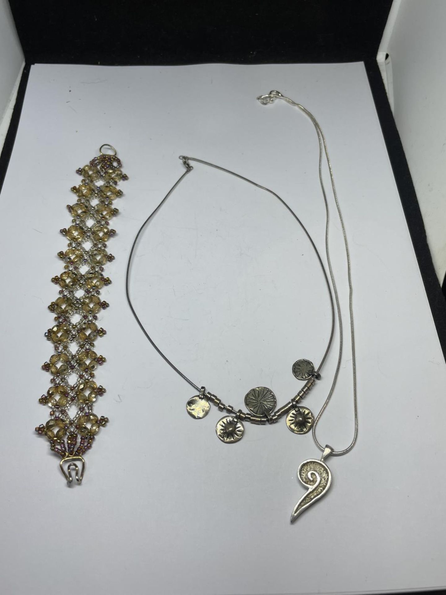 TWO SILVER NECKLACES AND SILVER CLASP BRACELET