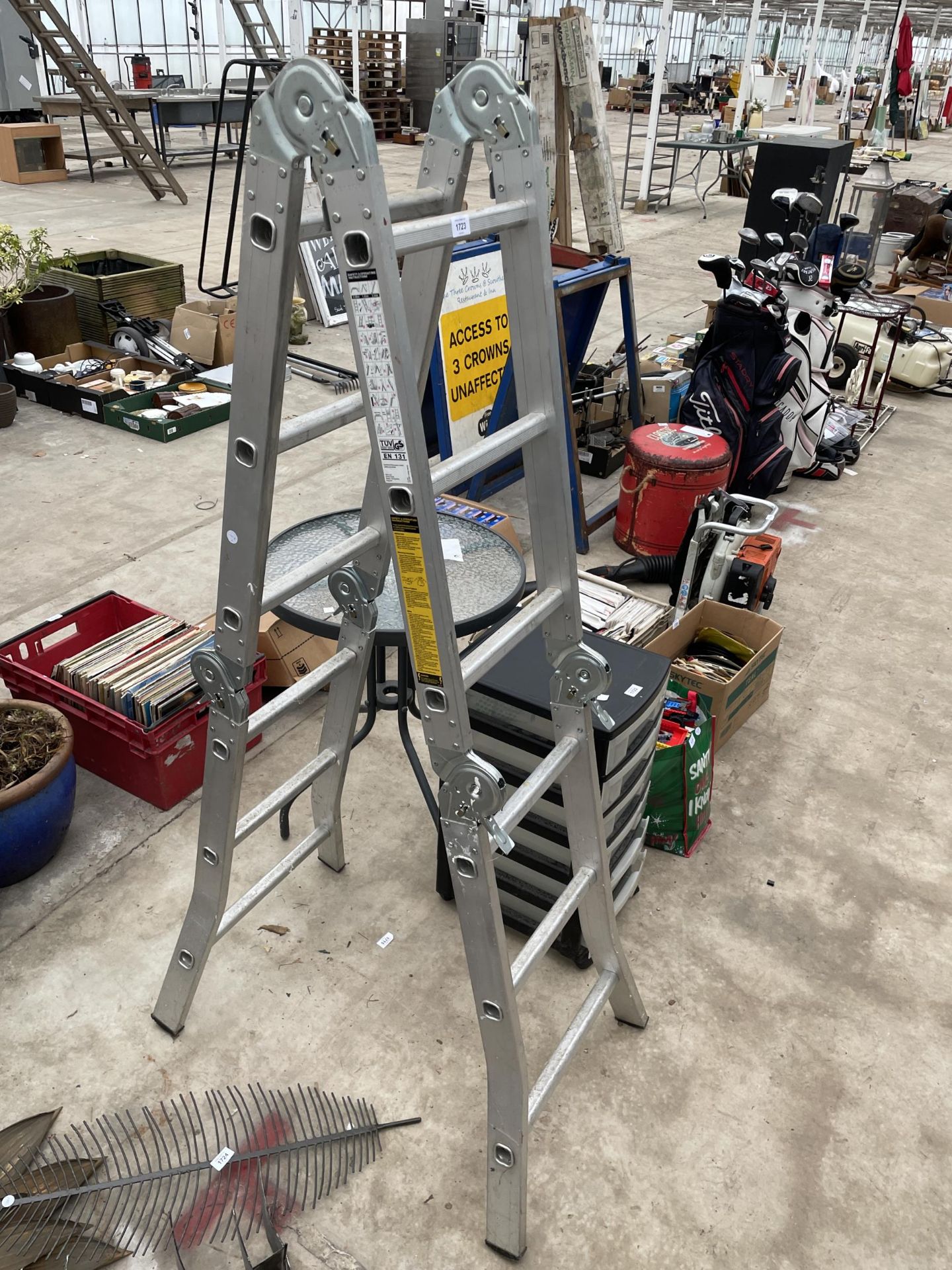 AN ALUMINIUM MULTI-PURPOSE FOLDING LADDER