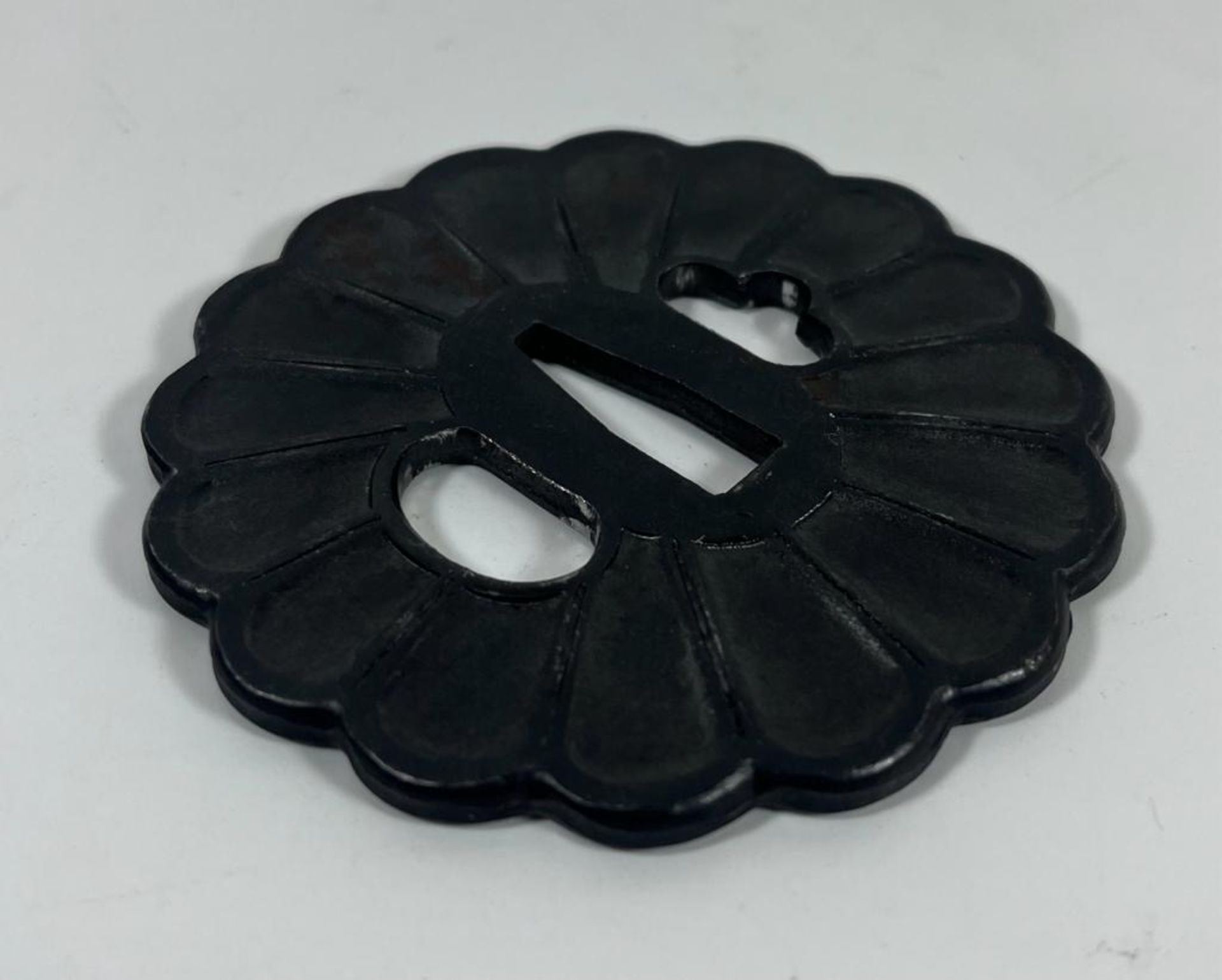 A JAPANESE IRON TSUBA WITH FLUTED DESIGN, DIAMETER 8 CM - Image 2 of 3