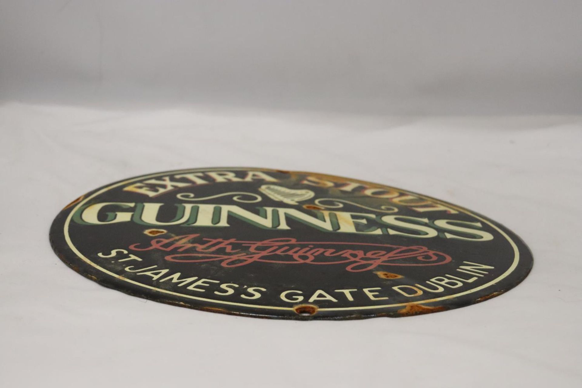 AN ENAMEL EXTRA STOUT GUINNESS CIRCULAR SIGN - Image 3 of 4