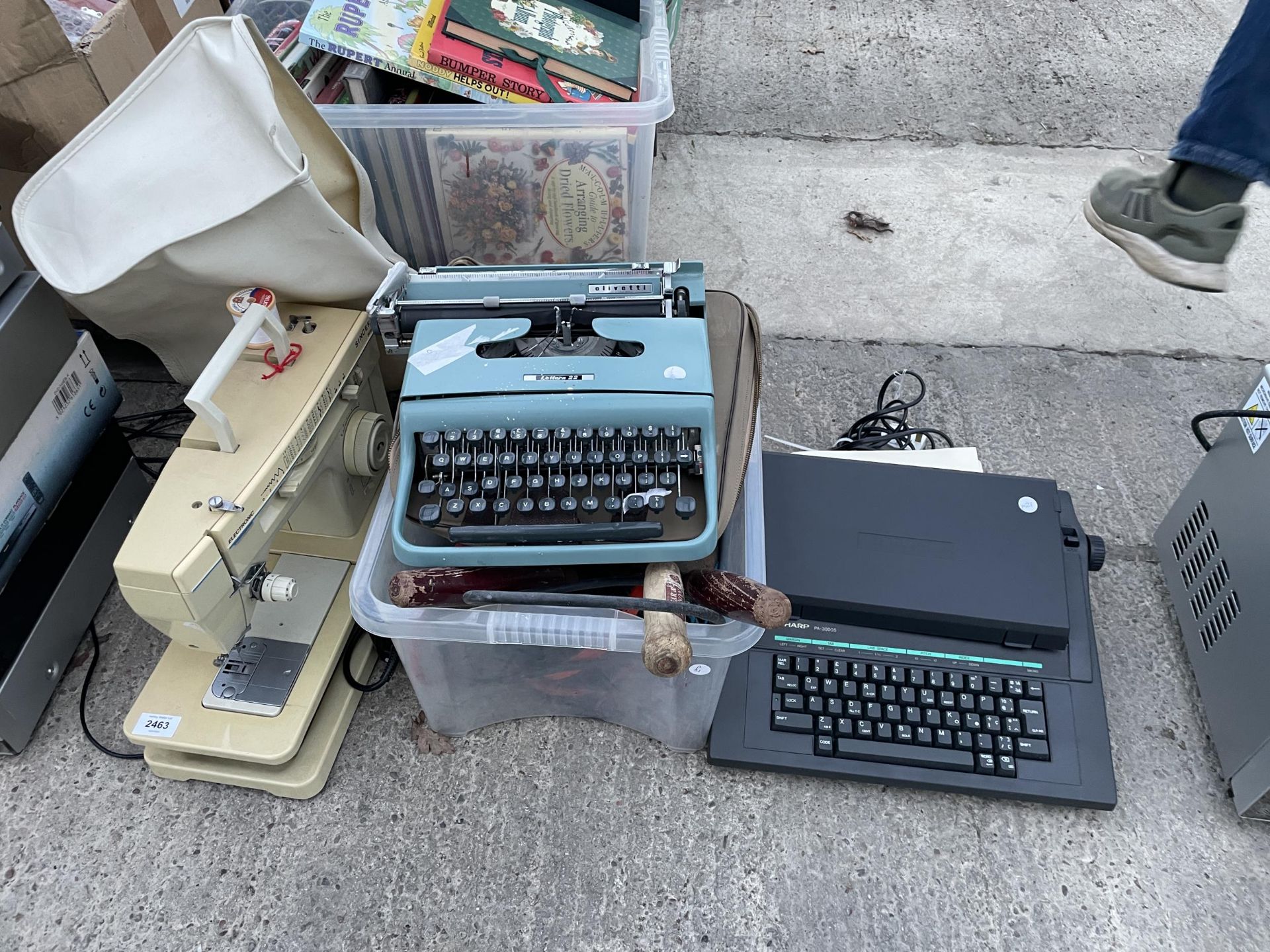 AN ASSORTMENT OF ITEMS TO INCLUDE TYPE WRITERS AND A SEWING MACHINE ETC