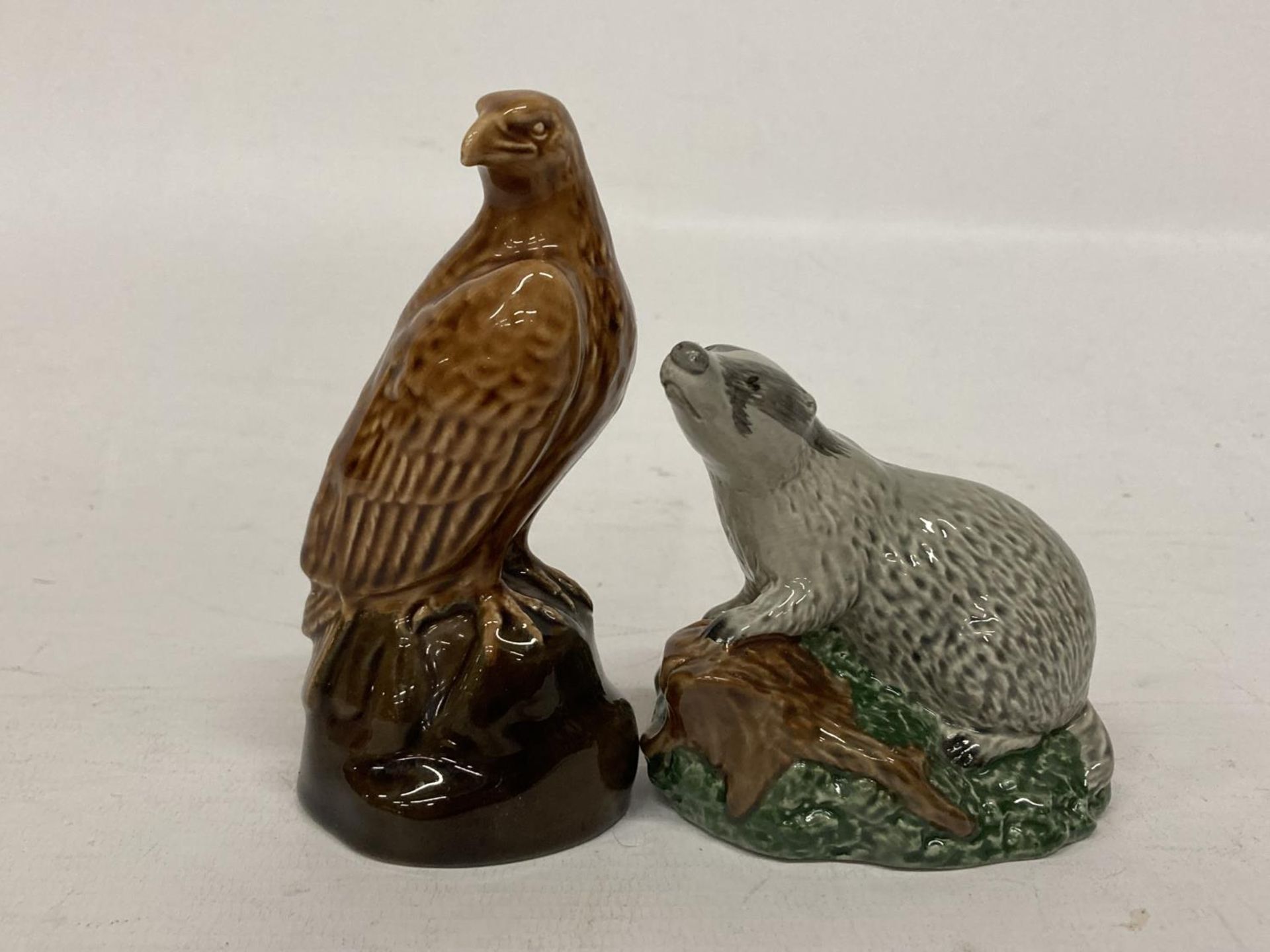 A BESWICK BENEAGLES MINIATURE SCOTCH WHISKEY EAGLE TOGETHER WITH A BADGER
