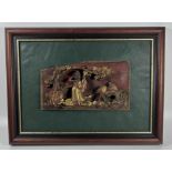 A CHINESE LACQUERED AND GILT CARVED WOODEN PANEL, ON LATER GREEN LEATHER MOUNT AND WOODEN FRAME,