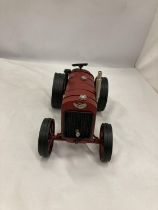 A TIN PLATE AND STEEL RED TRACTOR, HEIGHT 15CM, LENGTH 25CM