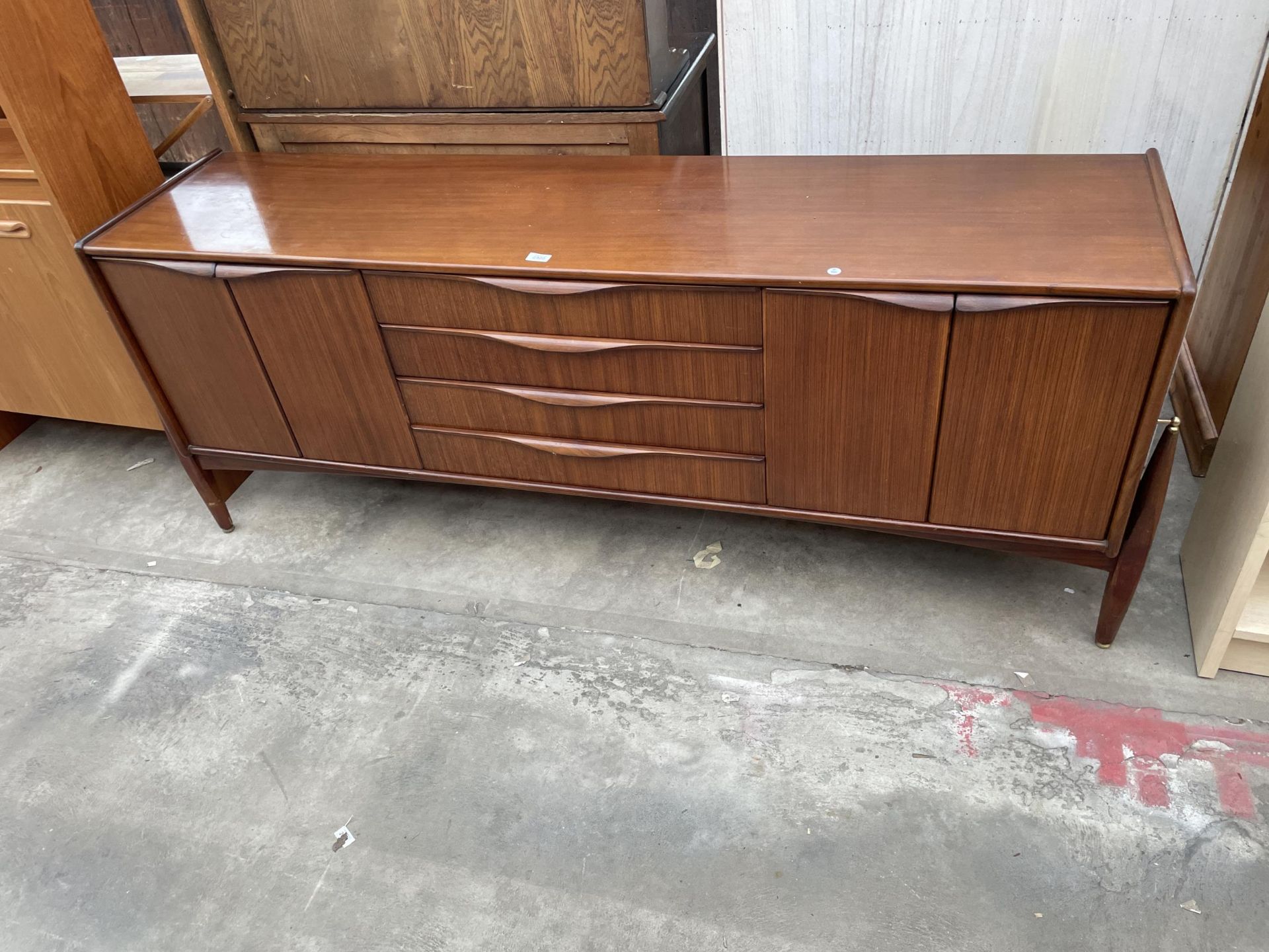 AN ELLIOTS OF NEWBURY ZEBRANO TEAK FLOATING SIDEBOARD, 76" WIDE ENCLOSING FOUR DRAWERS AND FOUR
