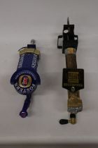 A FOSTERS BEER PUMP AND A THEAKSTONS PUMP