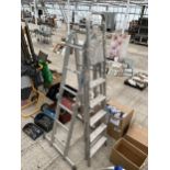 AN ALUMINIUM MULTIFUNCTION ABRU FOLDING LADDER AND A FIVE RUNG ALUMINIUM STEP LADDER