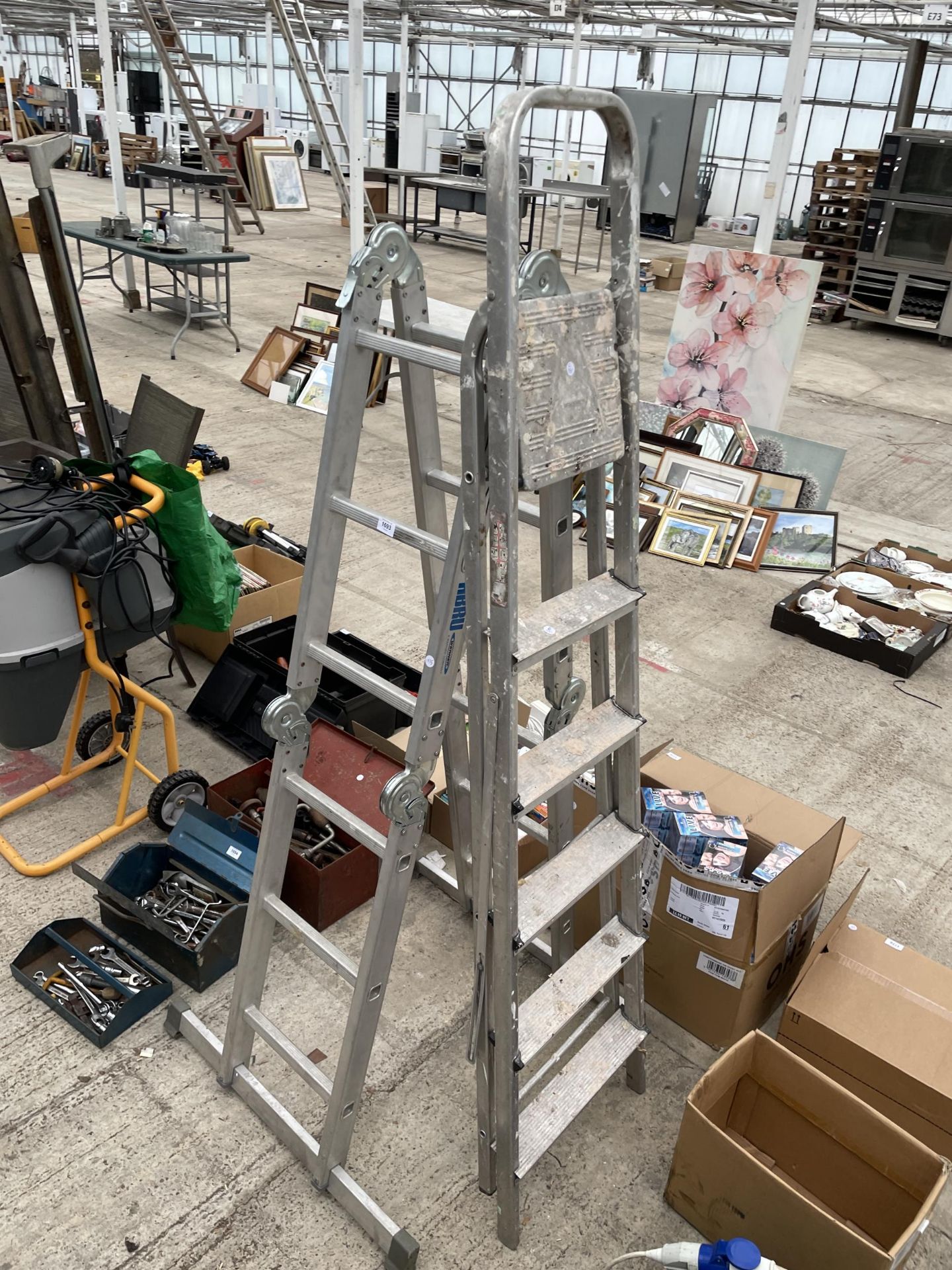 AN ALUMINIUM MULTIFUNCTION ABRU FOLDING LADDER AND A FIVE RUNG ALUMINIUM STEP LADDER