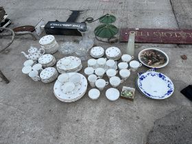 AN ASSORTMENT OF CERAMICS AND GLASS WARE TO INCLUDE PLATES AND TRIOS ETC