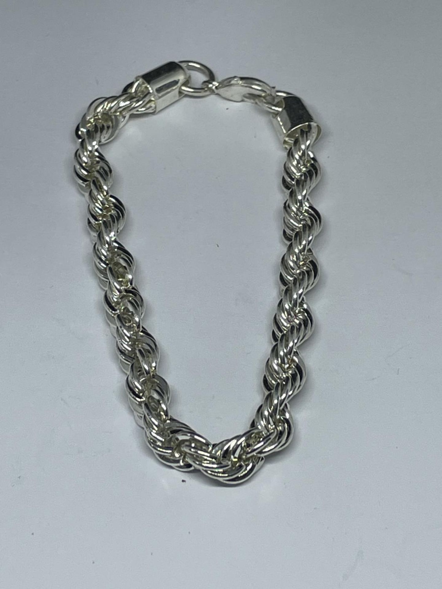 A SILVER WRIST CHAIN