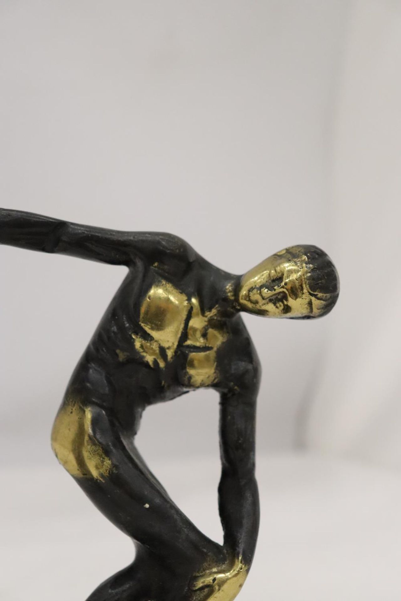 A HEAVY BRASS AND A WHITE METAL DISCUS THROWER - Image 2 of 5
