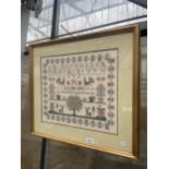 A GILT FRAMED TAPESTRY SAMPLER