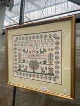 A GILT FRAMED TAPESTRY SAMPLER