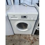 A WHITE LOGIK WASHING MACHINE