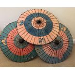 A GROUP OF THREE VINTAGE ORIENTAL FAN PARASOLS / UMBRELLAS