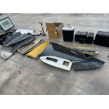 A LARGE ASSORTMENT OF VINTAGE FIBRE GLASS MODEL BOAT PARTS AND SPARES ETC