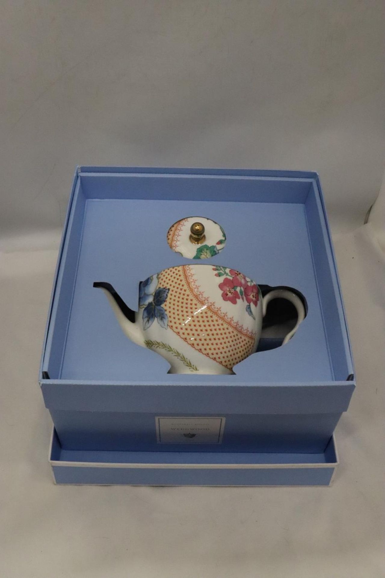 A BOXED WEDGWOOD TEAPOT BUTTERFLY BLOOM