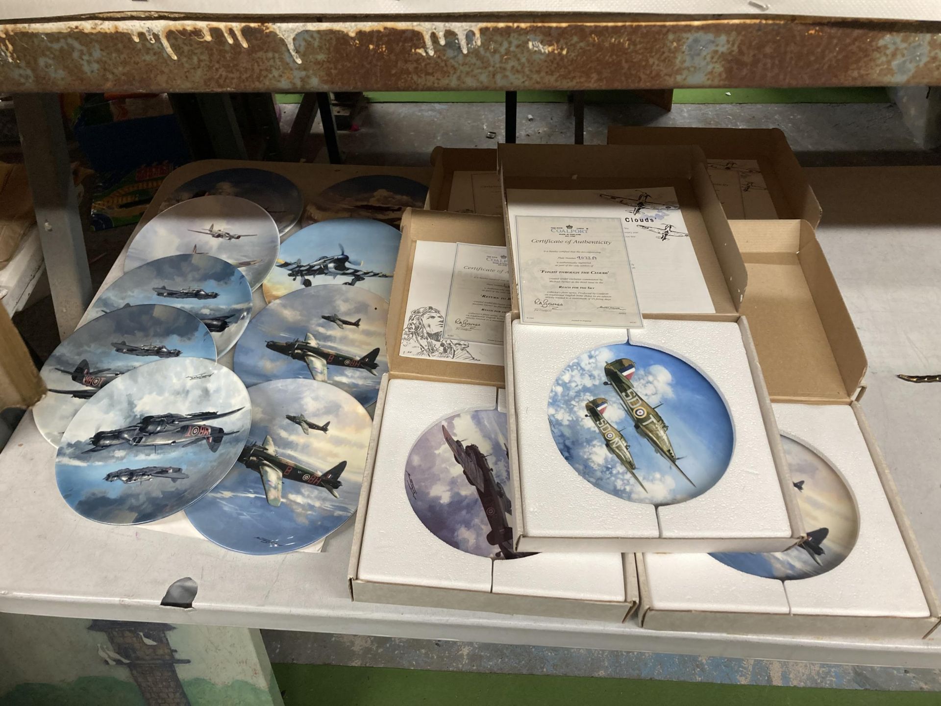 A LARGE QUANTITY OF COALPORT LIMITED EDITION PLATES "REACH FOR THE SKY" SOME IN BOXES AND WITH