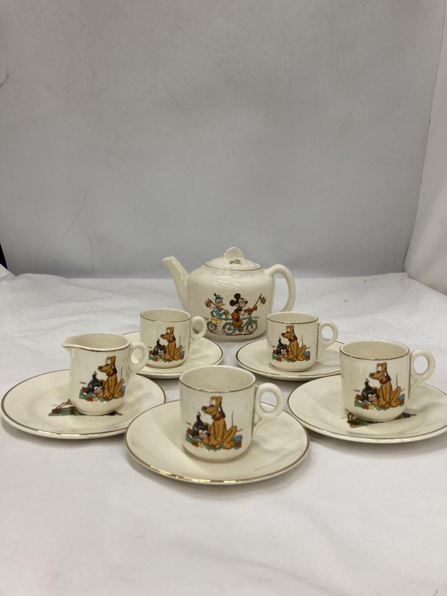 A BESWICK MICKEY MOUSE AND DISNEY CHILD'S TEASET