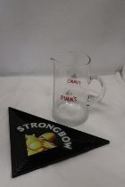A LARGE PIMMS JUG AND STRONGBOW MELAMINE DRIP TRAY