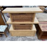 A BLOCKWOOD STORAGE UNIT WITH TWO WICKER DRAWERS AND PULL-OUT DRAWER TO THE BASE, 44" WIDE