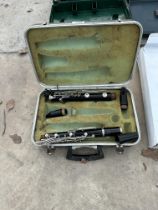 A PART COMPLETE BOOSEY & HAWKES LONDON CLARINET WITH CARRY CASE