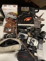 A COLLECTION OF VINTAGE CAMERAS AND ACCESSORIES TO INCLUDE PRAKTICA, CHINON, REGULETTE, KODAK, ETC