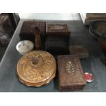 VARIOUS CARVED WOODEN BOXES AND CANDLESTICK