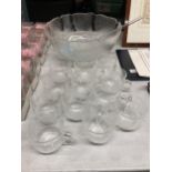 A GLASS PUNCHBOWL WITH CUPS