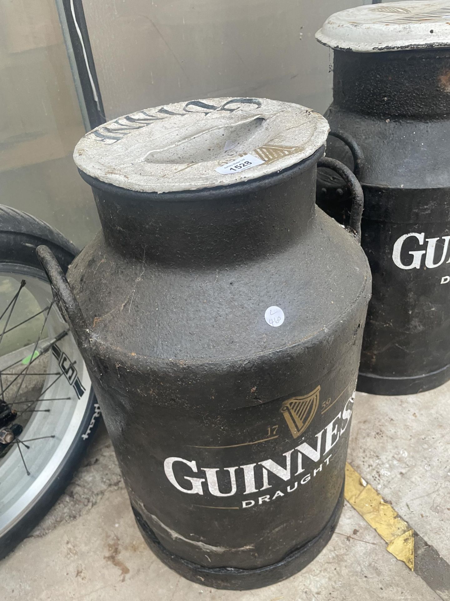 A DECORATIVE METAL MILK CHURN WITH LID AND GUINNESS DETAILING - Image 2 of 3