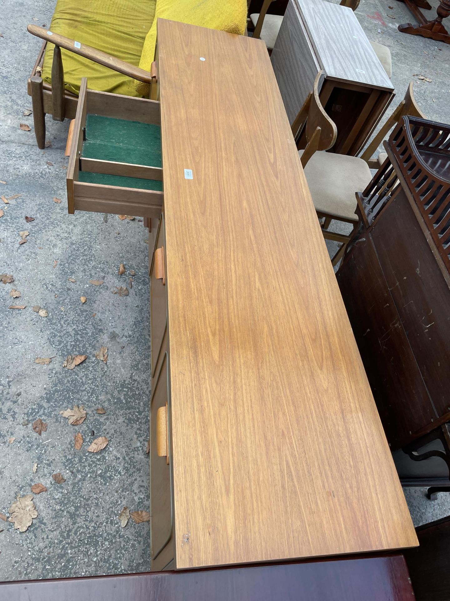 A RETRO TEAK SIDEBOARD ENCLOSING THREE DRAWERS, TWO CUPBOARDS AND DROP-DOWN COCKTAIL SECTION, 72" - Image 2 of 2