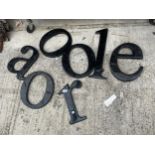 AN ASSORTMENT OF PLASTIC SIGN MAKING LETTERS