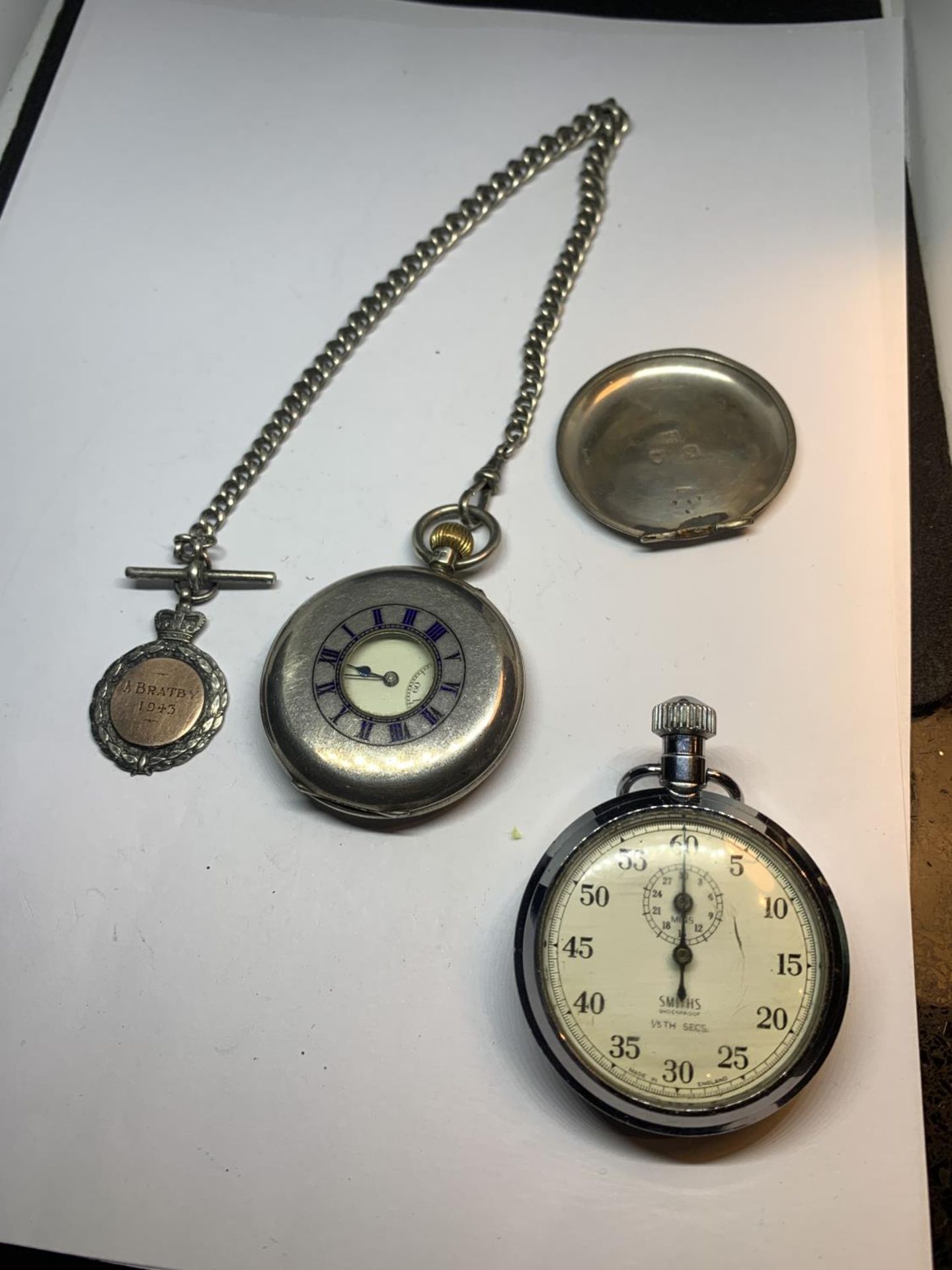 TWO ITEMS TO INCLUDE A HALLMARKED LONDON SILVER MILITARY POCKET WATCH WITH ENGRAVING, ON AN ALBERT