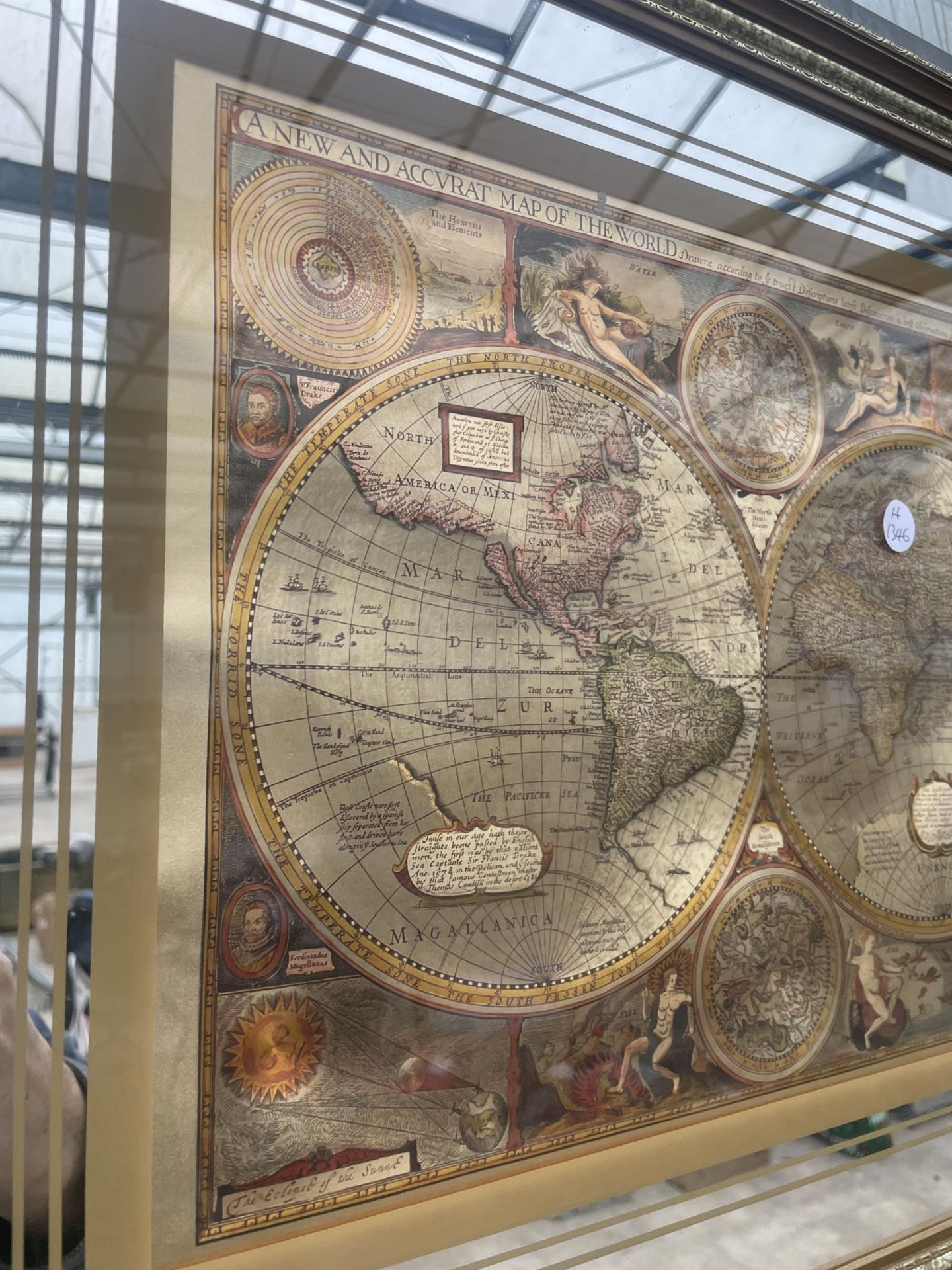 A GILT AND MIRRORED FRAMED 'NEW AND ACCVART MAP OF THE WORLD' - Image 2 of 3