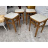 A SET OF FOUR 1970'S KITCHEN STOOLS