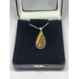 A BOXED SILVER TIGERS EYE NECKLACE