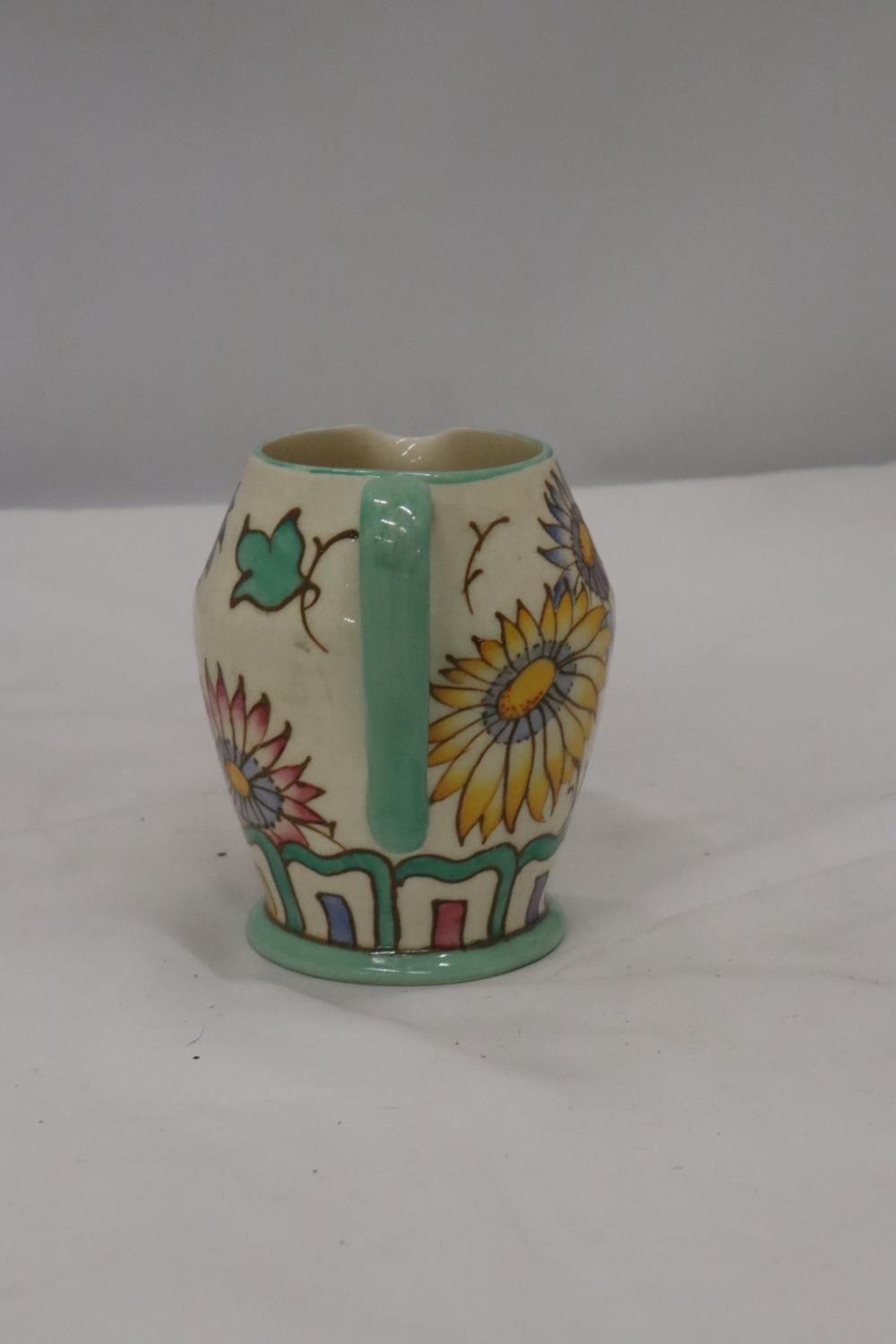 A CHARLOTTE RHEAD BURSLEY WARE JUG - Image 3 of 10