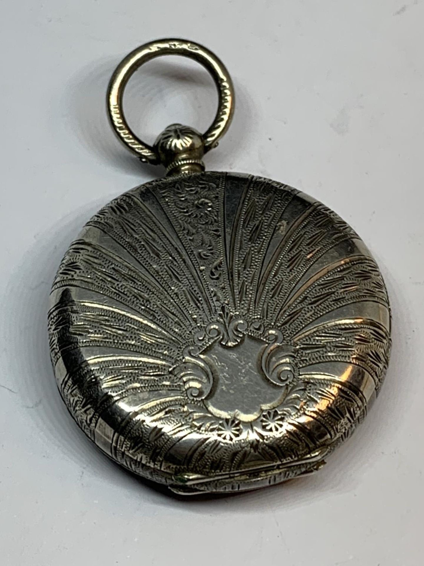 A MARKED 935 SILVER FOB WATCH WITH DECORATIVE ENAMEL FACE - Image 2 of 3