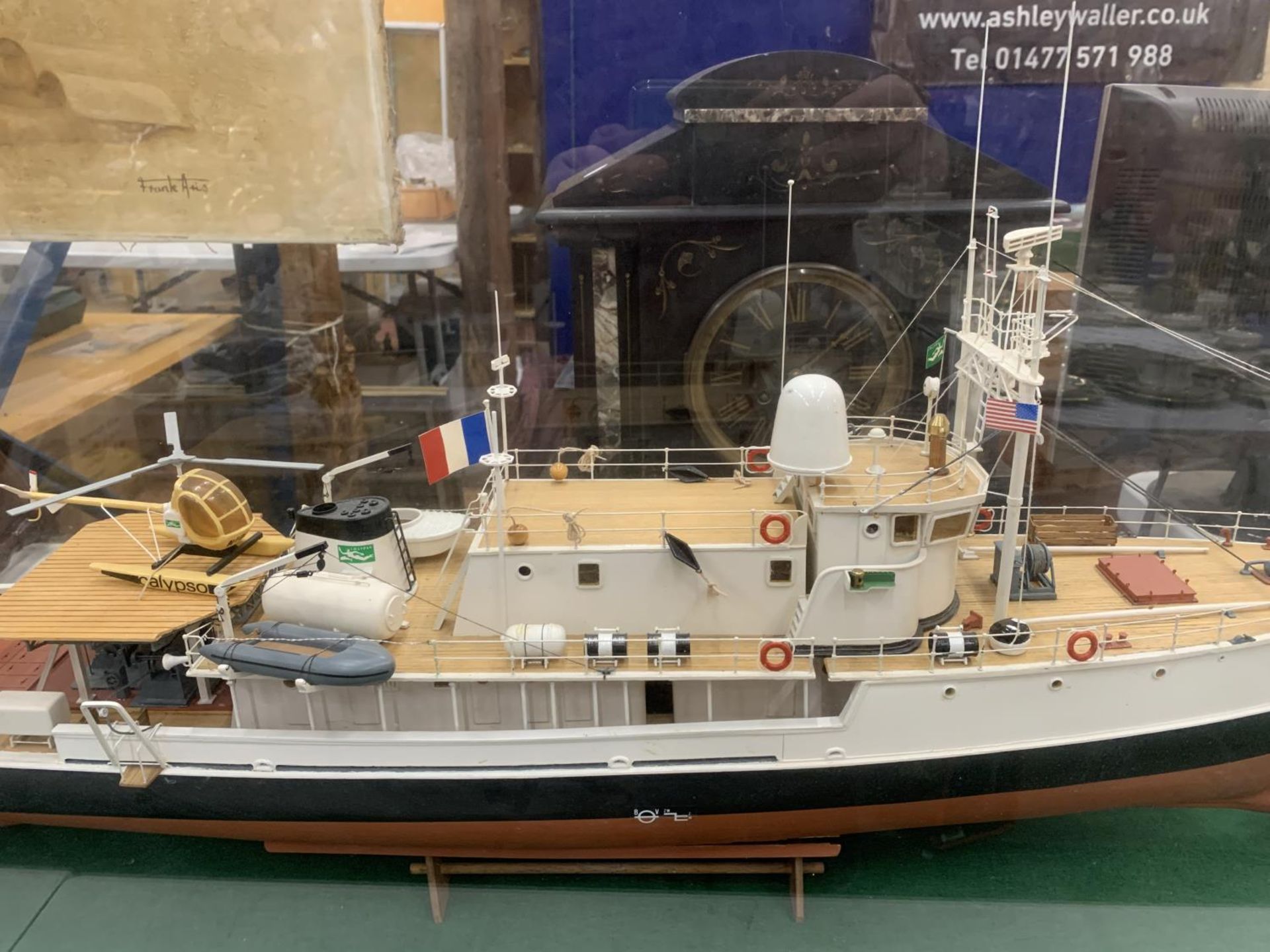 A LARGE MODEL OF A BOAT WITH HELICOPTER IN A GLASS CASE - Bild 3 aus 5