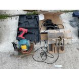 AN ASSORTMENT OF POWER TOOLS TO INCLUDE A BLACK AND DECKER BENCH GRINDER AND A ROUTER ETC