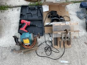 AN ASSORTMENT OF POWER TOOLS TO INCLUDE A BLACK AND DECKER BENCH GRINDER AND A ROUTER ETC