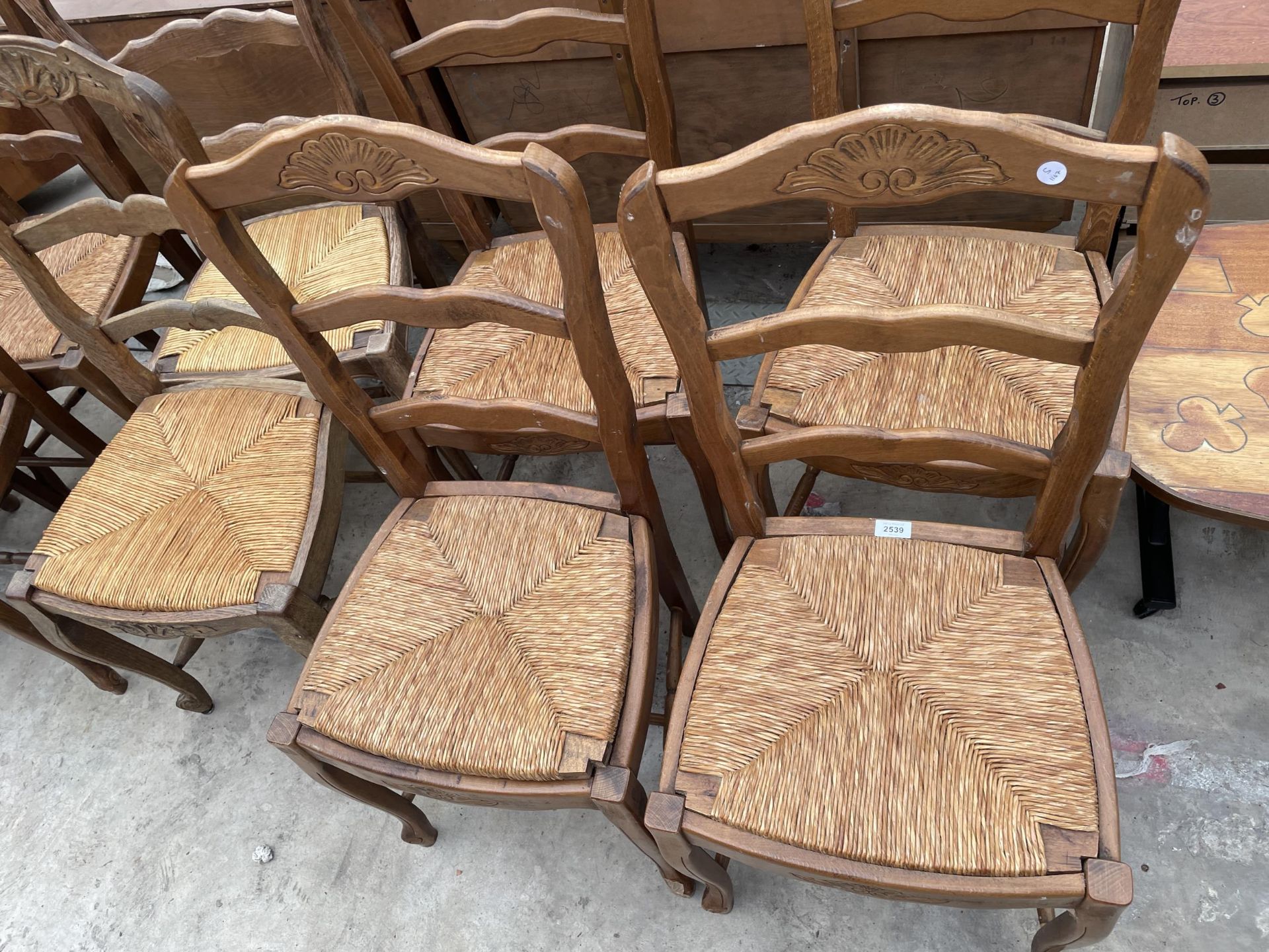 A SET OF EIGHT FRENCH LADDERBACK DINING CHAIRS WITH RUSH SEATS - Image 3 of 4