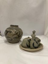 A STUDIO POTTERY BULBOUS VASE, PLATE AND CRUETS WITH MAKERS NAME TO THE BASE